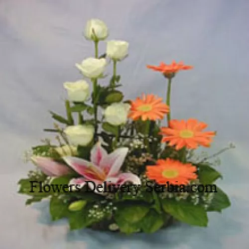 Basket Of Assorted Flowers Including Lilies, Roses And Daisies