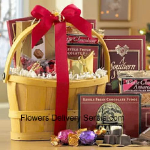 A classic combination of the finest gourmet chocolates make this a gift basket perfect for anybody that loves sweets. Includes Italian Chocolate Truffles, crunchy Almond Roca, a White Chocolate Amaretto Wafers, Chocolate Fudge, creamy rich Milk Chocolate, Belgian Chocolates, and assorted individually-wrapped Godiva Chocolates. We pack it all in a reusable handle basket and ship your gift straight to your recipients. (Please Note That We Reserve The Right To Substitute Any Product With A Suitable Product Of Equal Value In Case Of Non-Availability Of A Certain Product)